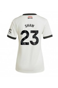 Manchester United Luke Shaw #23 Voetbaltruitje 3e tenue Dames 2024-25 Korte Mouw